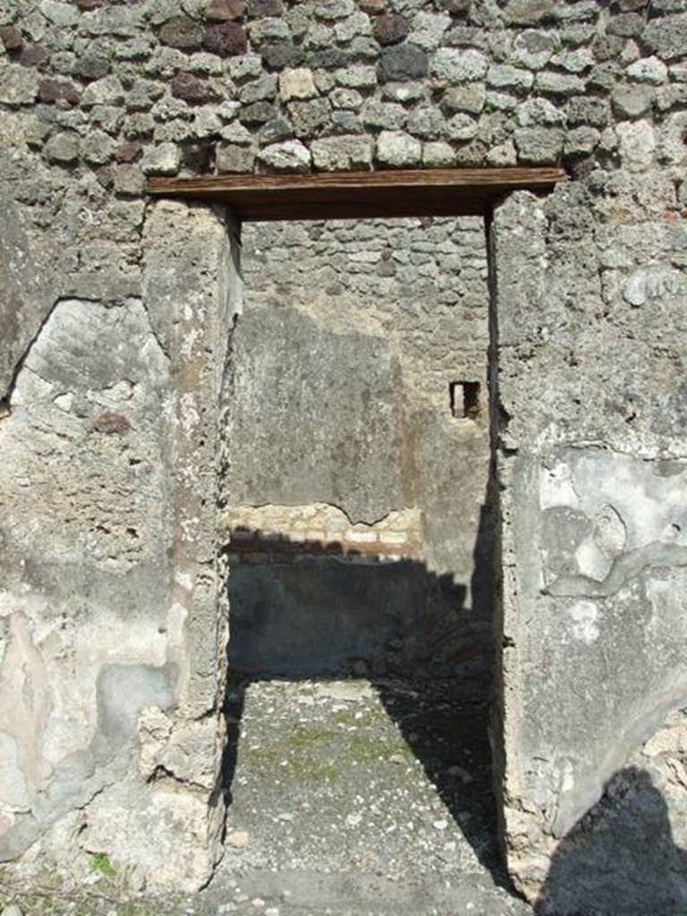 IX.2.18 Pompeii. March 2009.  Doorway to Room 2, Cubiculum, in East wall of Atrium.
