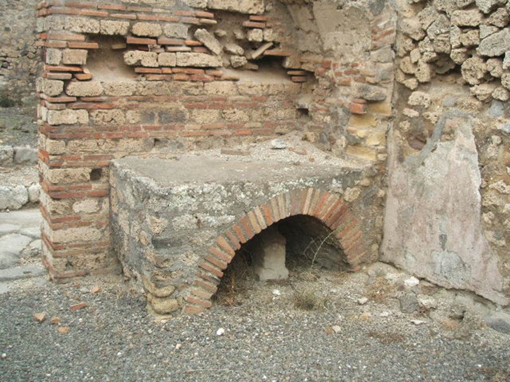 IX.2.25 Pompeii. May 2005. Hearth in north-east corner of caupona, near entrance.