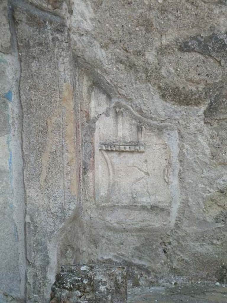 IX.3.5 Pompeii. September 2015. Remains of plaster decoration on west wall behind altar.

