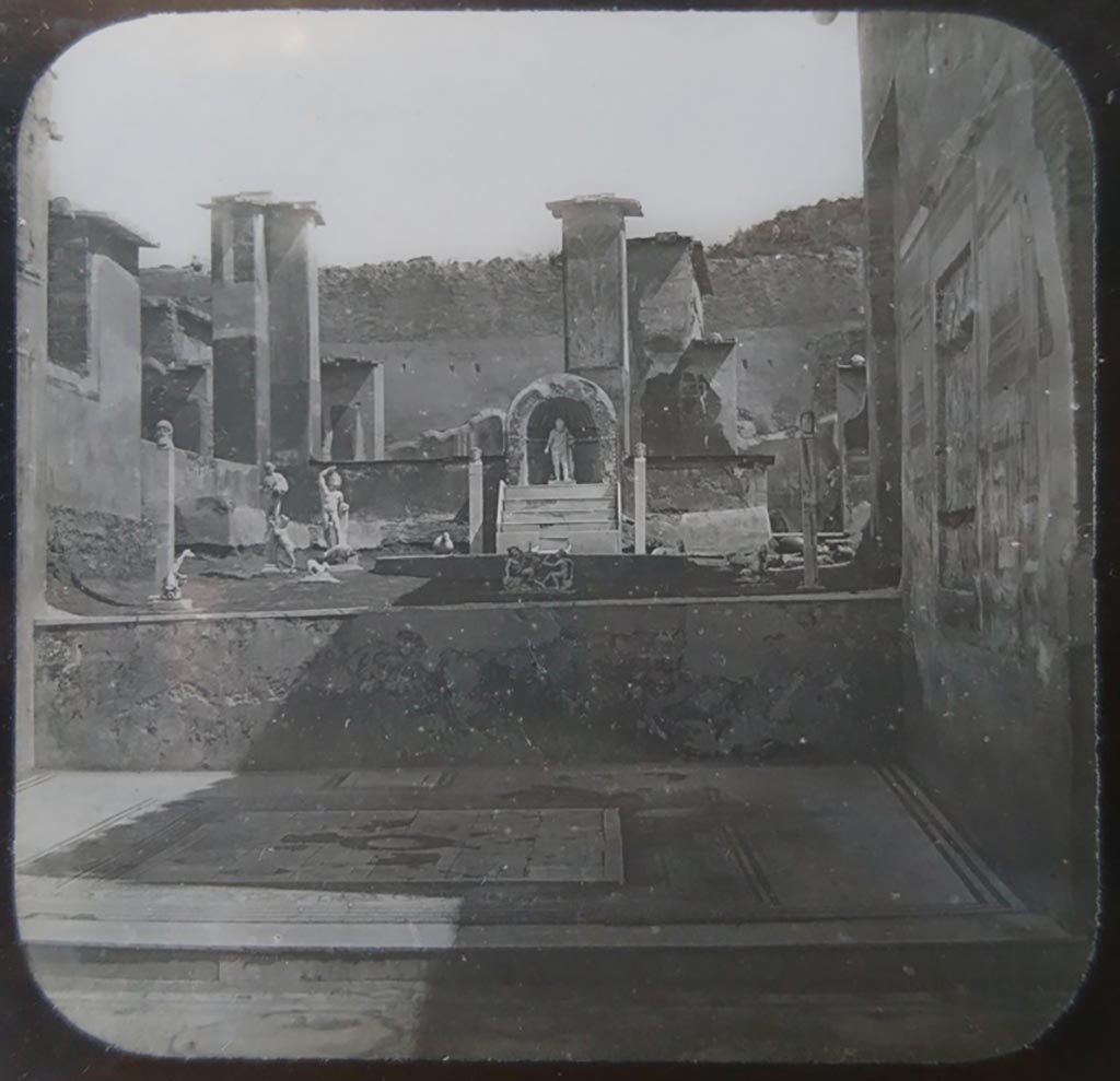 IX.3.5 Pompeii. c.1900. C. and G. Lantern slide published by A. Laverne. Looking east from tablinum towards garden. 
The south wall (on right) of the tablinum still appears to have painted decoration. 
