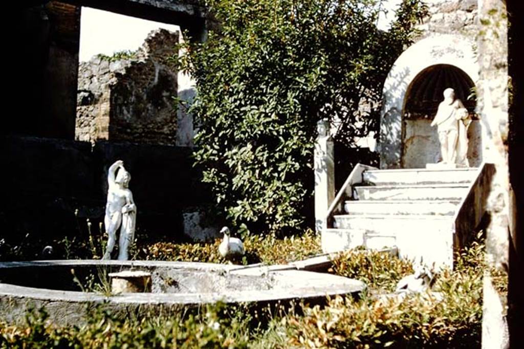 IX.3.5 Pompeii. 1959. Room 26, looking north-east across garden area with statues, in situ. 
Photo by Stanley A. Jashemski.
Source: The Wilhelmina and Stanley A. Jashemski archive in the University of Maryland Library, Special Collections (See collection page) and made available under the Creative Commons Attribution-Non Commercial License v.4. See Licence and use details.
J59f0372
