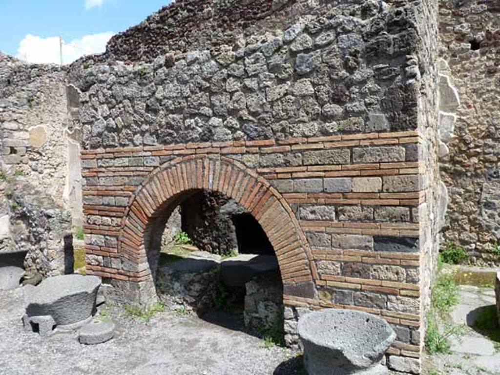 IX.3.12 Pompeii. Looking north-east to doorway to room on north side of oven, (on left).