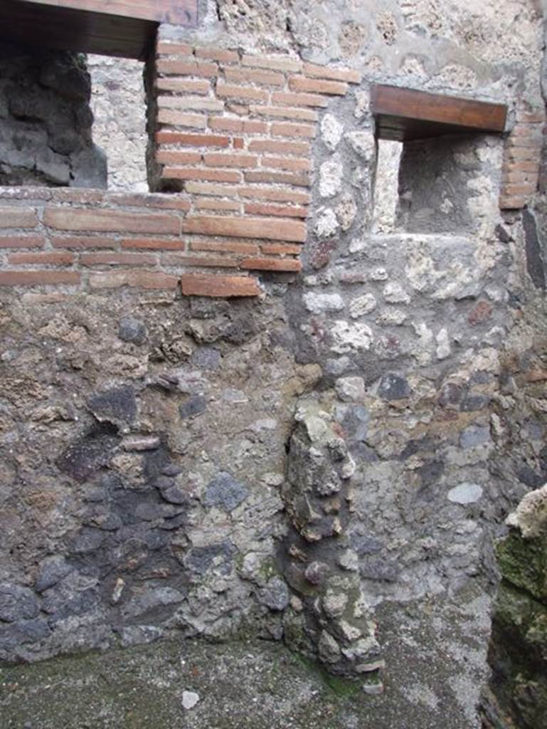 IX.3.17  Pompeii.  March 2009.  North wall in kitchen, and latrine.
