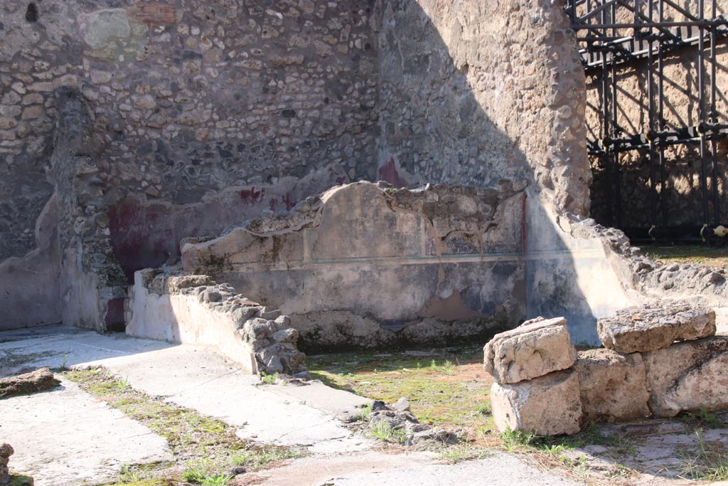 IX.3.22 Pompeii. October 2022. 
Looking towards room with black painted wall decorations towards north-west corner. Photo courtesy of Klaus Heese. 
