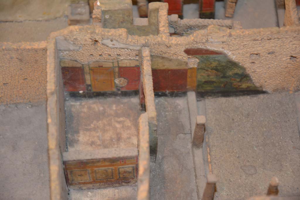 IX.5.9 Pompeii.  July 2017. Rooms in south-west corner of garden area, looking towards west walls.    
From cork model in Naples Archaeological Museum.
Foto Annette Haug, ERC Grant 681269 DÉCOR
