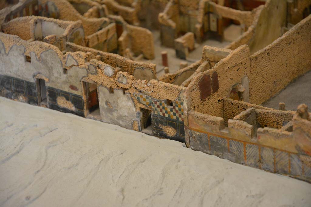 IX.5.19/18 and 17, in centre, Pompeii. July 2017. North front facade on unnamed vicolo between IX.5 and IX.6.
Extract from cork model in Naples Archaeological Museum.
Foto Annette Haug, ERC Grant 681269 DÉCOR.

