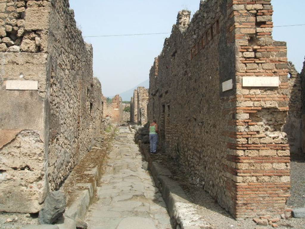 IX.3 Pompeii. May 2005.      Vicolo di Tesmo, looking north.          Corner of IX.6.a.
