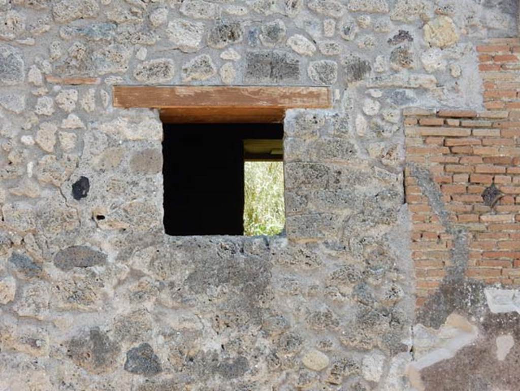 IX.7.16 Pompeii, May 2018. Renovated window to cubiculum on north side of entrance doorway. Photo courtesy of Buzz Ferebee.
