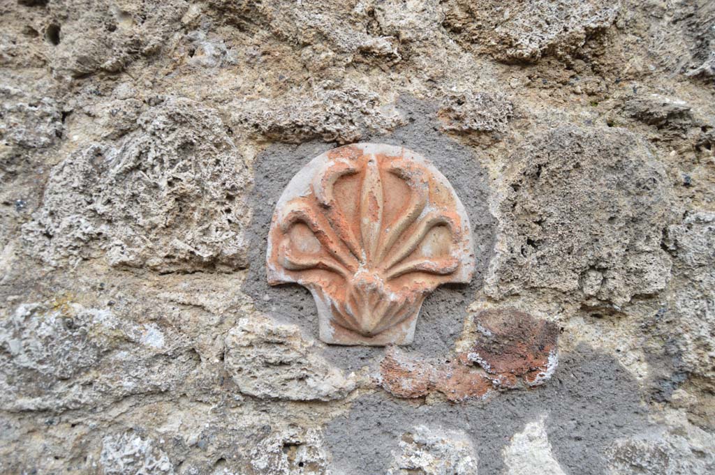 IX.7.21 Pompeii. March 2018. 
Looking east towards terracotta decoration embedded in masonry.
Foto Taylor Lauritsen, ERC Grant 681269 DÉCOR.
