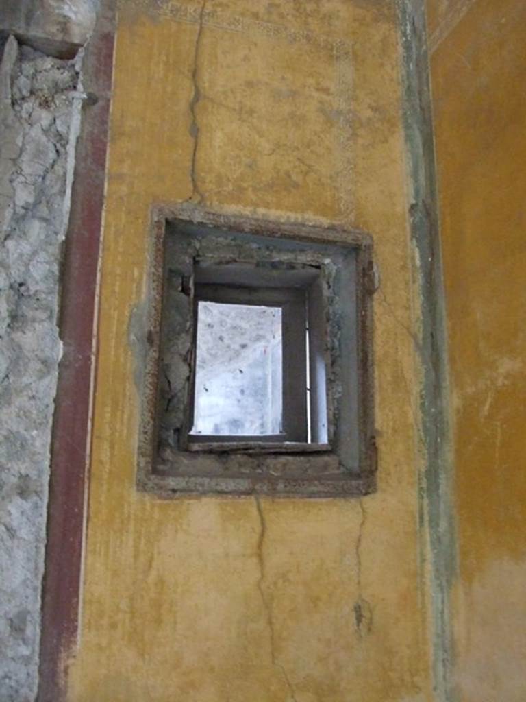 IX.8.6 Pompeii. December 2007. Room 39, east wall of outer room. Peephole window into cubiculum 40, from outer room.