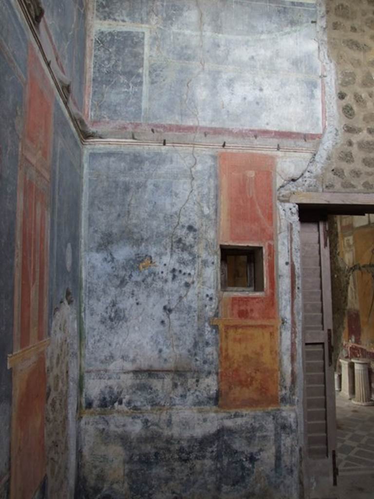 IX.8.6 Pompeii. December 2007. Room 40, west wall of cubiculum, south of doorway. Peephole window from inside the bedroom.