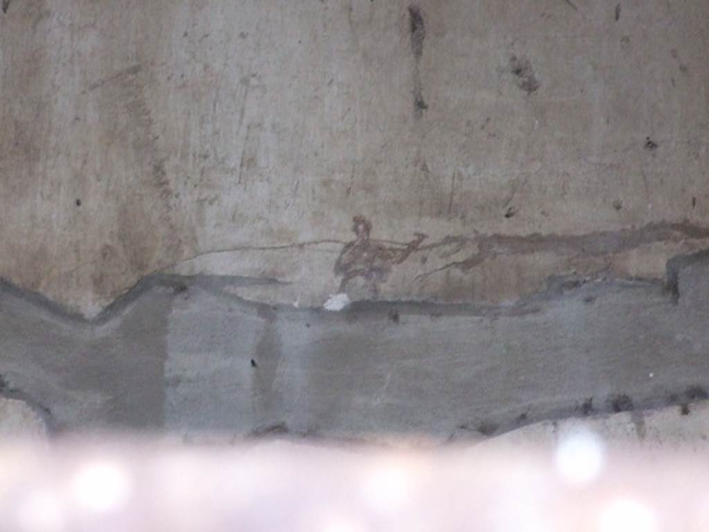IX.8.6 Pompeii. March 2009. Room 57, remains of painting of figure on north wall in white triclinium. 