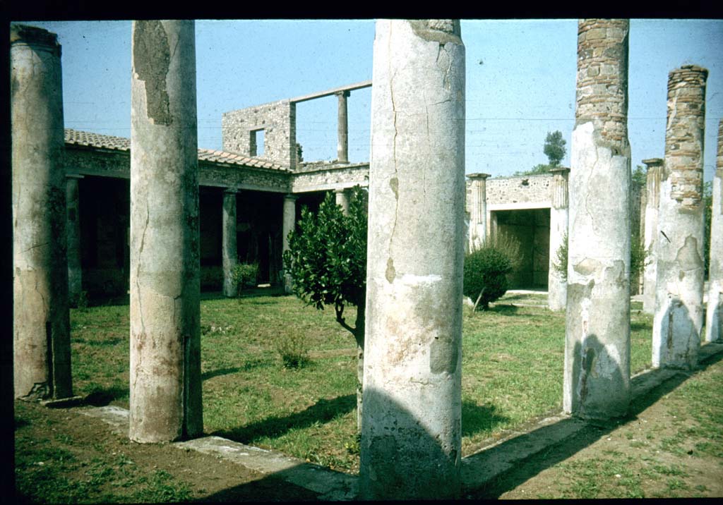 IX.8.6 Pompeii. South-east corner of Portico. Looking north-west.
Photographed 1970-79 by Günther Einhorn, picture courtesy of his son Ralf Einhorn.
