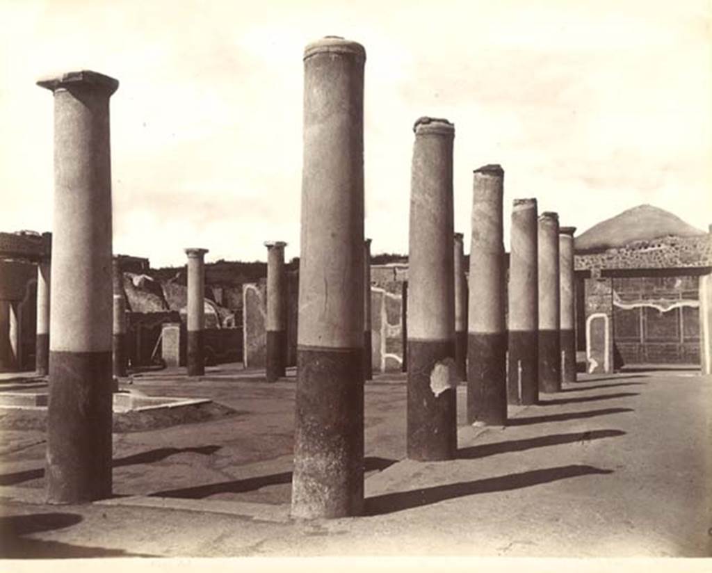 IX.8.6 Pompeii. c.1890s? G. Sommer no. 1254, wrongly identified as Casa del Fauno.
Looking north-west across the peristyle from outside room 12, the east portico is on the right. 
Photo courtesy of Rick Bauer.
