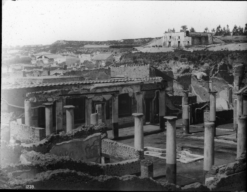 IX.8.6 Pompeii. c.1880s? no. 1239 presumably taken by G. Sommer, as above photo. 
Looking north-west across the peristyle from outside and above the exterior wall. 
Photo by permission of the Institute of Archaeology, University of Oxford. File name instarchbx208im 117. Resource ID. 44442.
See photo on University of Oxford HEIR database
