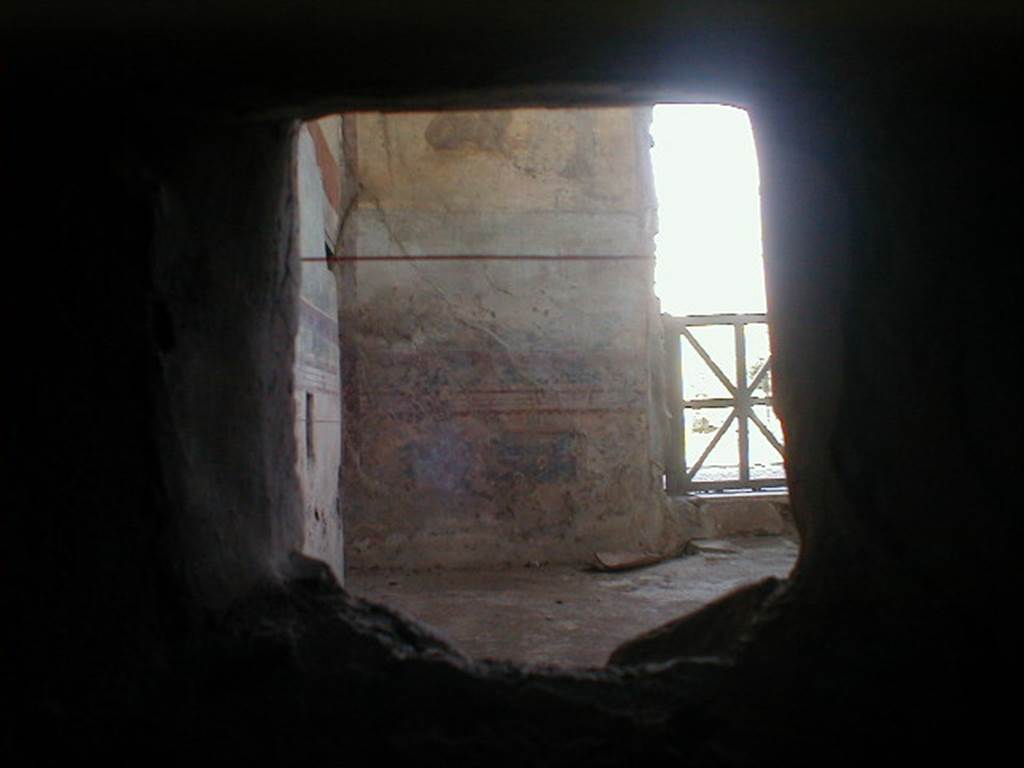 IX.8.6 Pompeii.  September 2004.  Room 18, Looking into Nymphaeum through duct in service corridor.

