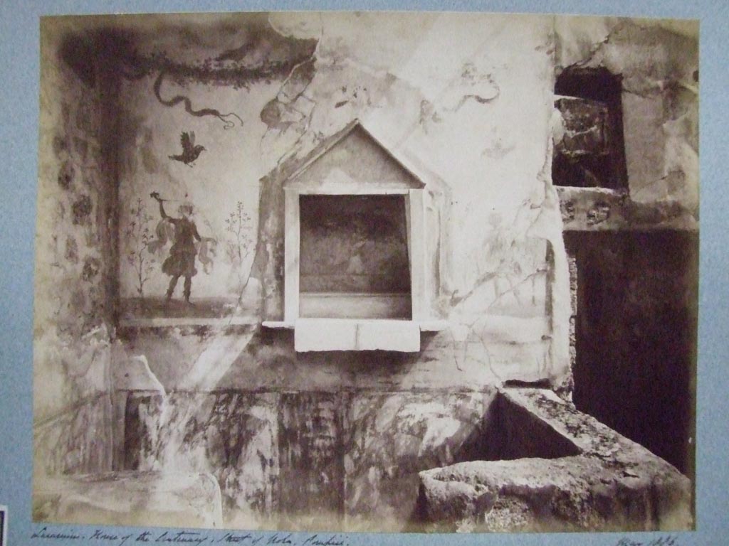 IX.8.6/a Pompeii. Photo dated May 1886. Lararium in kitchen area of House of the Centenary.
The Bacchus painting has been removed.
Photo courtesy of Society of Antiquaries. Fox Collection.
