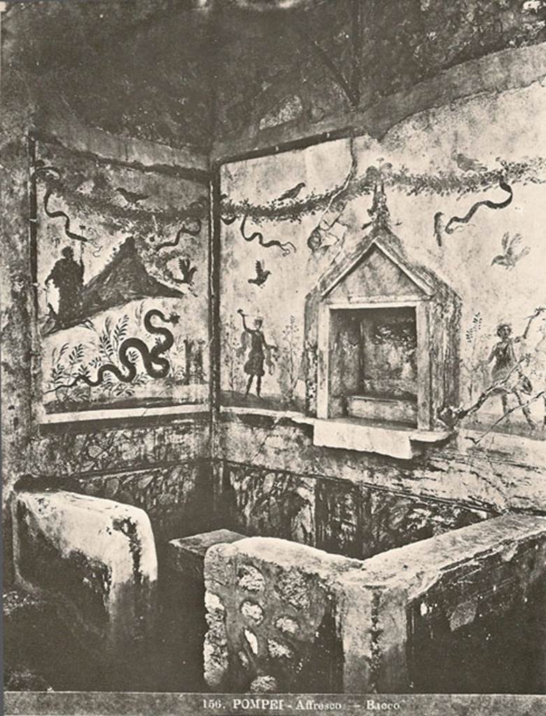IX.8.6 Pompeii. Old postcard. Possibly just after excavation circa 1879-1881?  
Room 23. Servants’ quarters on west side of house. 
Household shrine or lararium with Bacchus painting still in situ.
