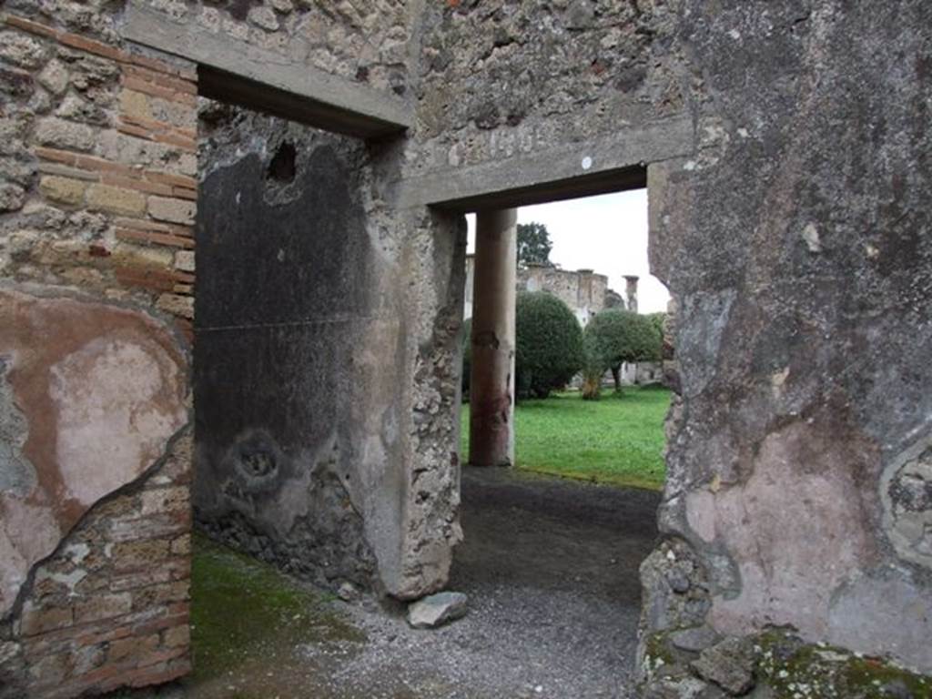 IX.8.6 Pompeii. March 2009.   Doorway to Room 30 Corridor leading north.  
Looking east through doorway to West Portico
