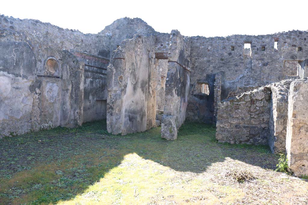 IX.8.b Pompeii. February 2020. 
Looking south-west across atrium, towards niche in south wall, on left, and entrance doorway in west wall, in centre.
Photo courtesy of Aude Durand.
