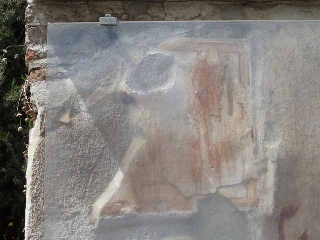 Pompeii. December 2007. Graffiti and painting on front wall between IX.11.7 and IX.11.8.