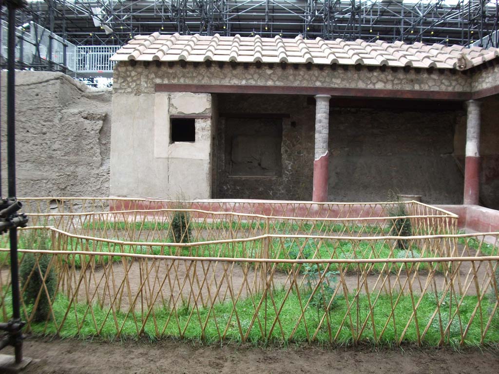 IX.12.9 Pompeii. May 2010. Looking west across garden area 8 towards room 18 and west portico.