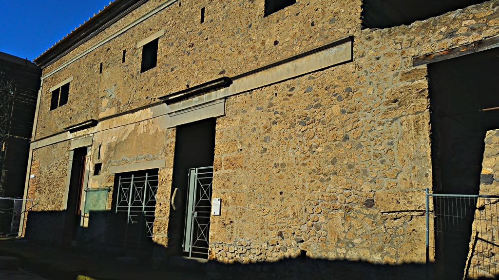 IX.13.1-3 Pompeii. December 2019. Looking west along front façade. Photo courtesy of Giuseppe Ciaramella.
