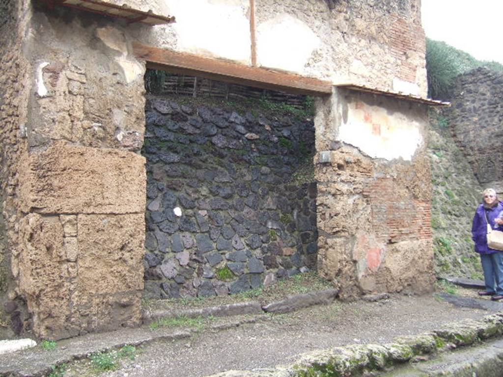 IX.13.6 Pompeii. December 2005. Entrance on Via dell’Abbondanza. 
According to Della Corte, in this workshop carrying on an unknown industry or trade was a certain Sex. Ceius. Found on the east (right) of the entrance was an electoral recommendation –
Sex. Ceius f(acit)    [CIL IV 7974]
And also on the same wall –
[Sex. Cei fr- (or indeed) p]ater fac   [CIL IV 7973 with a note that said “if however the fragment was “ator” perhaps it expressed the profession of Ceio”.
According to Epigraphik-Datenbank Clauss/Slaby (See www.manfredclauss.de), these read as –
]ator fac(it)       [CIL IV 7973]
L(ucium)  Ceium  Secundum 
iuvenem  optimum 
d(uumvirum)  i(ure)  d(icundo)  o(ro)  v(os)  f(aciatis)  Sex(tus)  Ceius  f[acit]       [CIL IV 7974]
