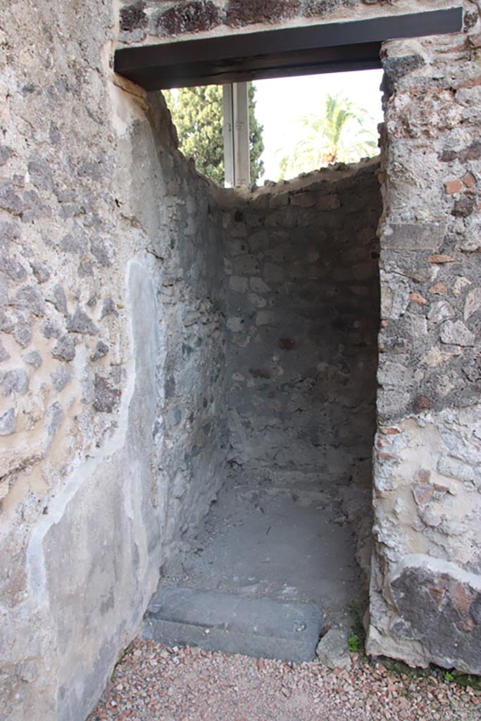 HGW24 Pompeii. Villa of Diomedes. October 2023.
Doorway on west side of peristyle, leading to stairs to an upper floor. Photo courtesy of Klaus Heese.
