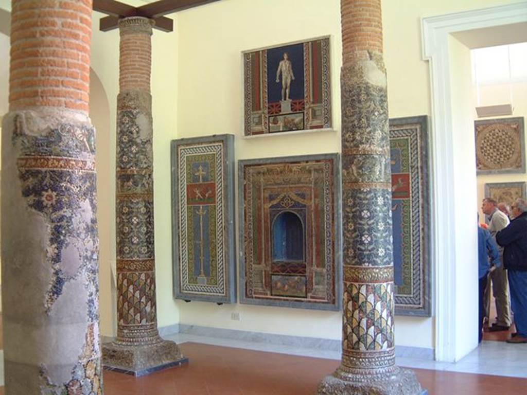 HGE12 Villa of the Mosaic Columns. Two of the mosaic columns.
Now in Naples Archaeological Museum. Inventory numbers 9996 (front) and 9995 (rear).

