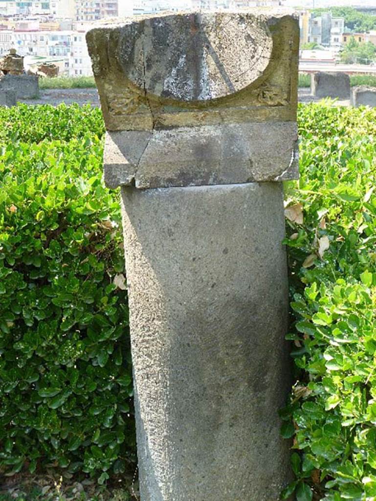 Villa San Marco, Stabiae, July 2010. Area 66, sundial in peristyle garden. Photo courtesy of Michael Binns.
According to Jashemski, this second large peristyle garden had only been partially excavated.
She thought the colonnade of the peristyle continued towards the north.
She thought that this part of the peristyle was destroyed in antiquity when the ledge on which it was built fell down.
The portico, supported by stuccoed columns the upper parts of which were spirally fluted, contained an art gallery of unusual paintings.
These were badly damaged by the 1980 earthquake.
The root cavities of two trees were found, one near the sundial in the north part of the garden.
See Jashemski, W. F., 1993. The Gardens of Pompeii, Volume II: Appendices. New York: Caratzas, (p. 306).
