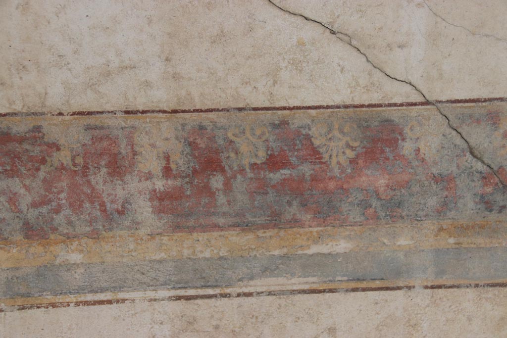 Villa San Marco, Stabiae, October 2022. 
Portico 2, detail of painted decoration from lower border on painted panel on east wall. Photo courtesy of Klaus Heese.

