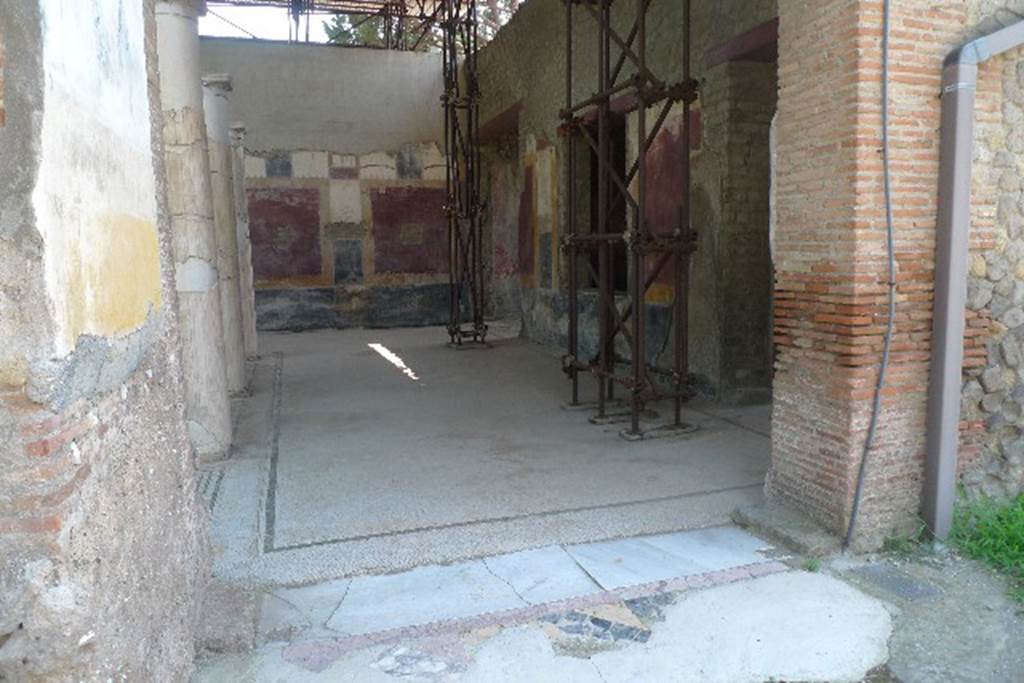 Villa San Marco, Stabiae, July 2010. 
Looking west along room 5, the north portico to west portico 3, from south end of the pool. 
Photo courtesy of Michael Binns.
