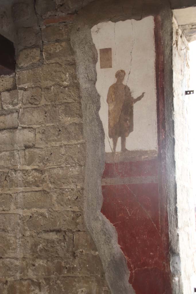 Villa San Marco, Stabiae, September 2019. Room 8, east wall, detail of figure to left of window. Photo courtesy of Klaus Heese.