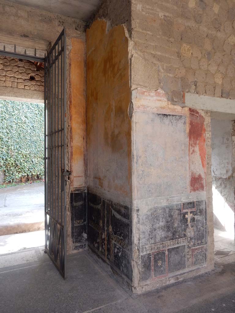 Villa San Marco, Stabiae, June 2019. Room 44, west side of entrance doorway, with doorway to room 57, on right.
Photo courtesy of Buzz Ferebee.

