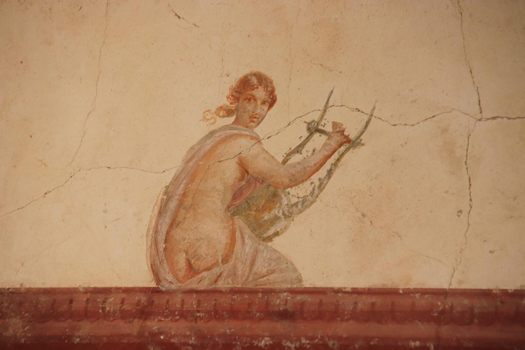 Villa San Marco, October 2022. 
Room 30, painted figure with lyre from upper south wall in south-east corner. Photo courtesy of Klaus Heese.
