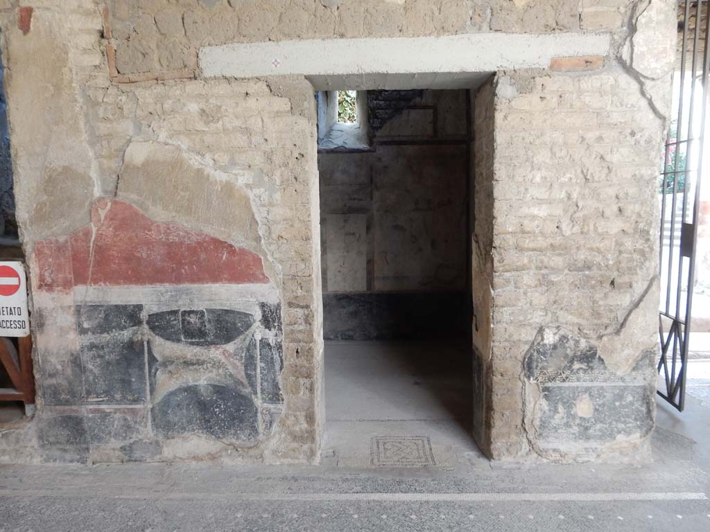 Villa San Marco, Stabiae, June 2019. Looking south to doorway to room 61, in south-east corner of atrium. 
Photo courtesy of Buzz Ferebee.

