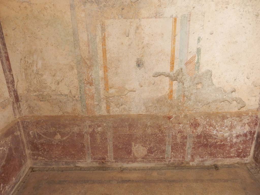 Villa San Marco, Stabiae, June 2019. Room 57, painted zoccolo and south wall. Photo courtesy of Buzz Ferebee