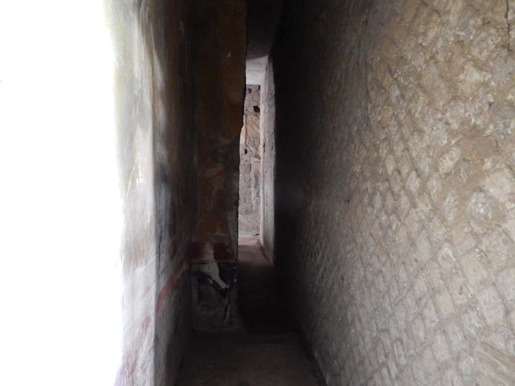 Villa San Marco, Stabiae, June 2019. Room 26, gaping hole, from 18th century tunnelling, in south wall near west wall of kitchen.
Looking north into room 27, and the narrow corridor 39 that joins with corridor 49.
Photo courtesy of Buzz Ferebee
