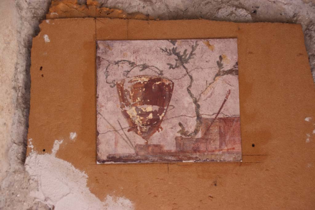 Villa San Marco, Stabiae, September 2019. Room 52, reproduction painted panel from east end of north wall. Photo courtesy of Klaus Heese. 
Original now in Naples Archaeological Museum. Part of inventory number 9952.

