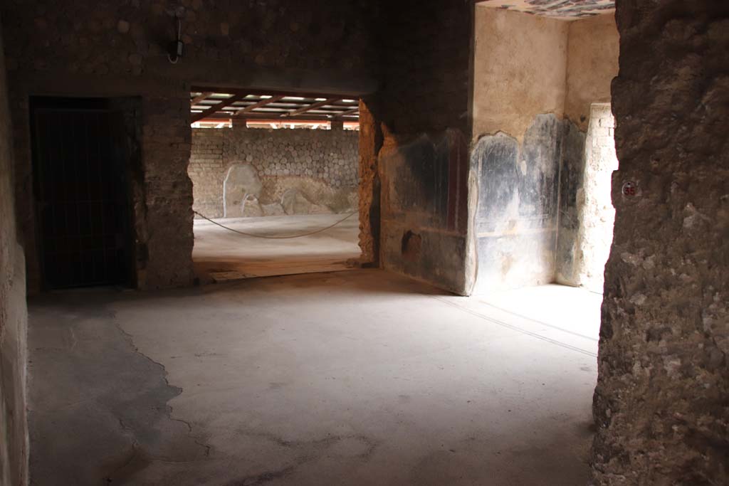 Villa San Marco, Stabiae, September 2019. Looking through doorway to room 35, anteroom.
Looking north to doorway to room 46, on left, and room 48, the palestra or gymnasium, in centre.
On the right, is a square alcove in the anteroom.  Photo courtesy of Klaus Heese.
