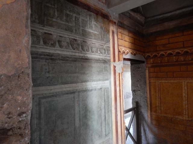 Villa of Mysteries, Pompeii. May 2010. Room 3, east wall from room 64. Looking towards doorway into corridor F1.