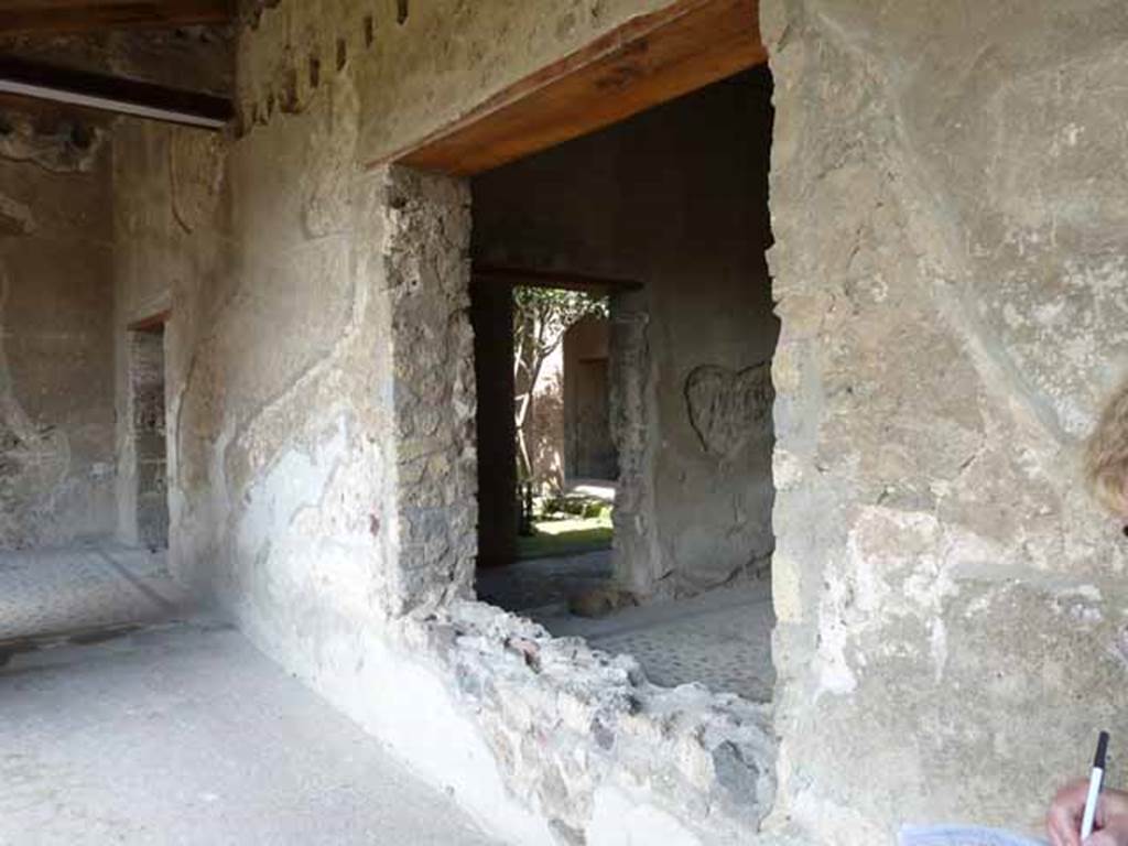 Villa of Mysteries, Pompeii. May 2010. Looking north-east through window into room 47, and out through doorway into room 62.