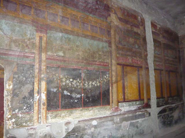 Villa of Mysteries, Pompeii. September 2021. 
Room 6, painted detail on west wall above doorway to corridor F1. Photo courtesy of Klaus Heese.
