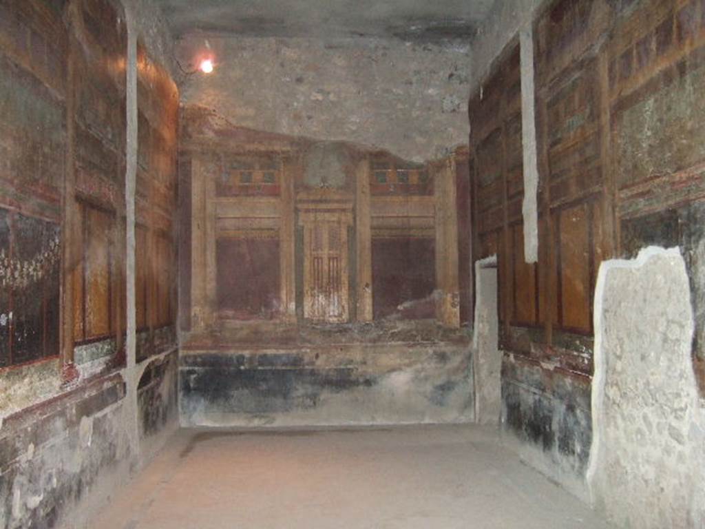Villa of Mysteries, Pompeii. April 2014. Room 6, detail from north wall above painted doorway in centre. 
Photo courtesy of Klaus Heese.

