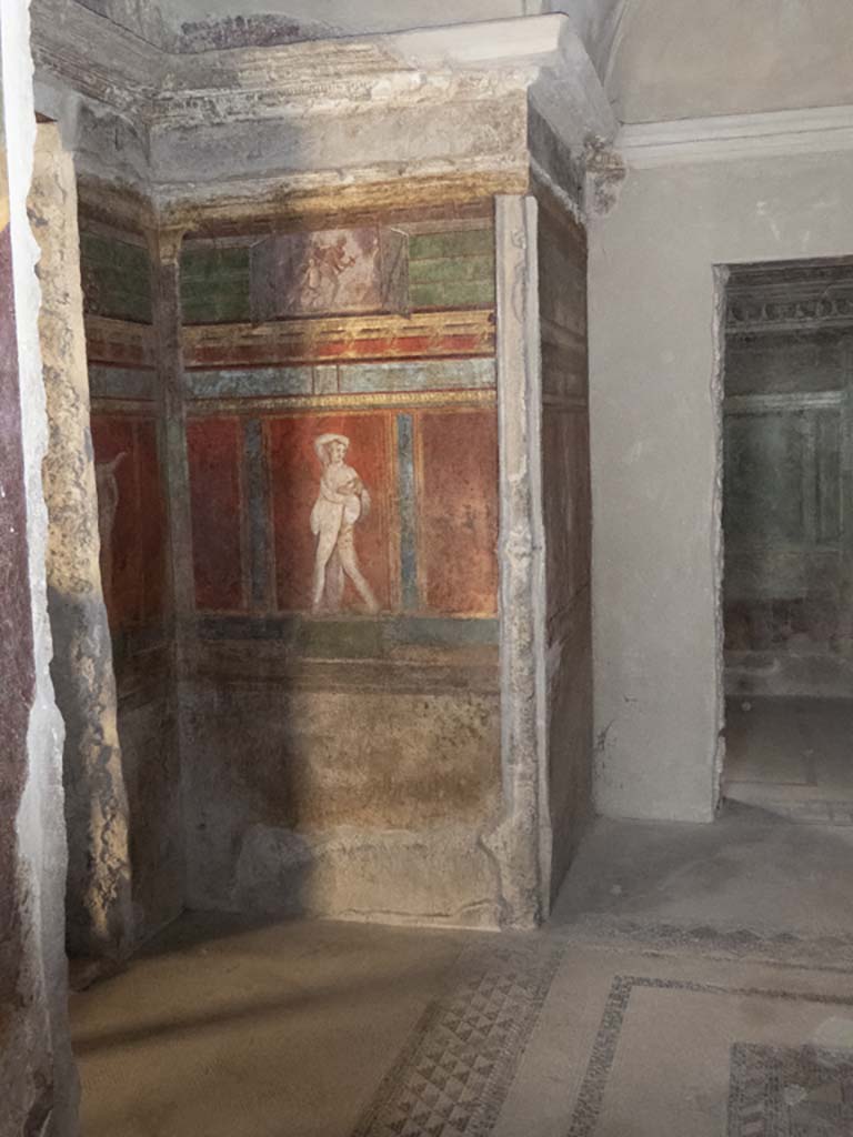 Villa of Mysteries, Pompeii. May 2006. Room 4, north side of doorway to room 3 under arched ceiling, wall painting of Silenus and a satyr. 
