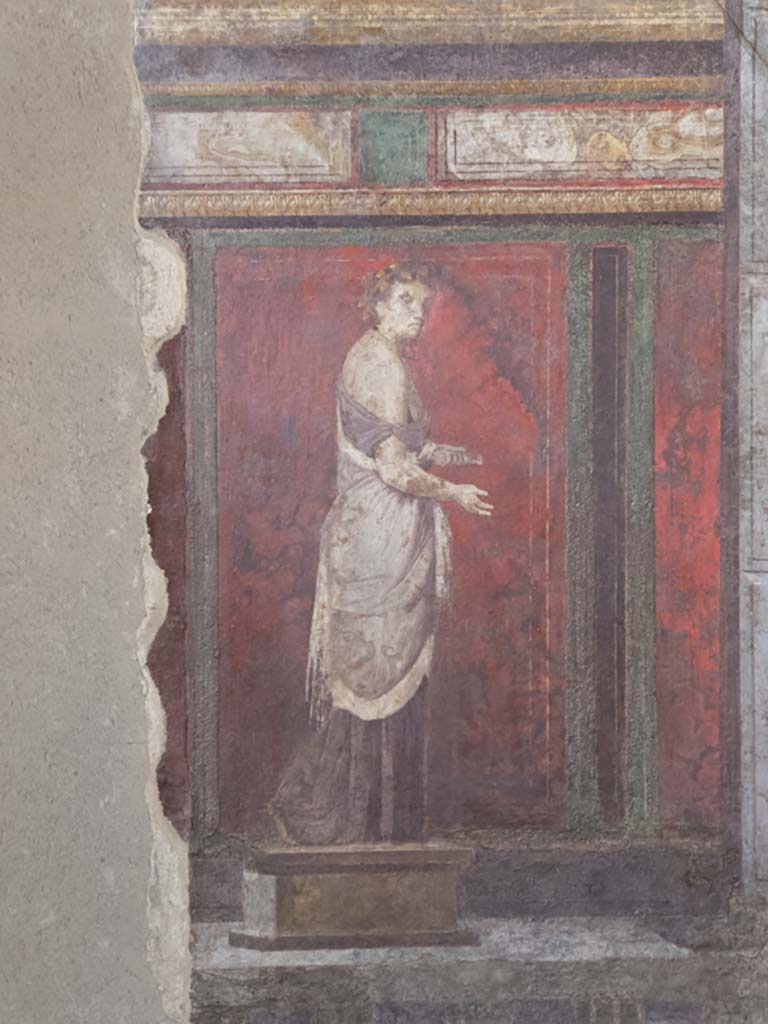 Villa of Mysteries, Pompeii. April 2014. Room 4, detail of wall painting of a dancing satyr, on south wall.
Photo courtesy of Klaus Heese.

