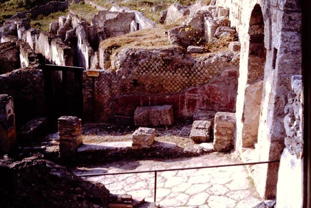 Via Marina. Pompeii. 1964. Looking north across Via Marina towards exterior wall of Suburban Baths, and Porta Martina on the right.   Photo by Stanley A. Jashemski.
Source: The Wilhelmina and Stanley A. Jashemski archive in the University of Maryland Library, Special Collections (See collection page) and made available under the Creative Commons Attribution-Non Commercial License v.4. See Licence and use details.
J64f1737
