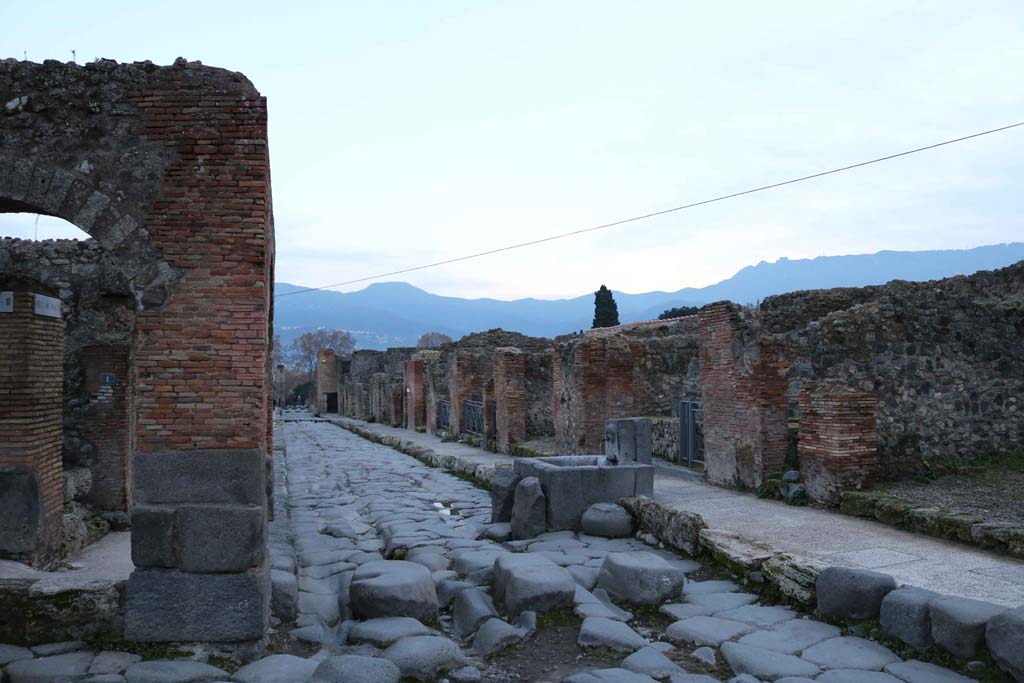Via Stabiana, at IX.2.1, Pompeii, on left. December 2018. 
Looking south between IX.2, on left, and VII.1, on right. Photo courtesy of Aude Durand.
