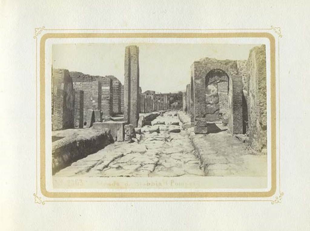 Via Stabiana, Pompeii. Album dated January 1875. Looking north between VII.1 and IX.2, towards junction with Via degli Augustali. Photo courtesy of Rick Bauer.
